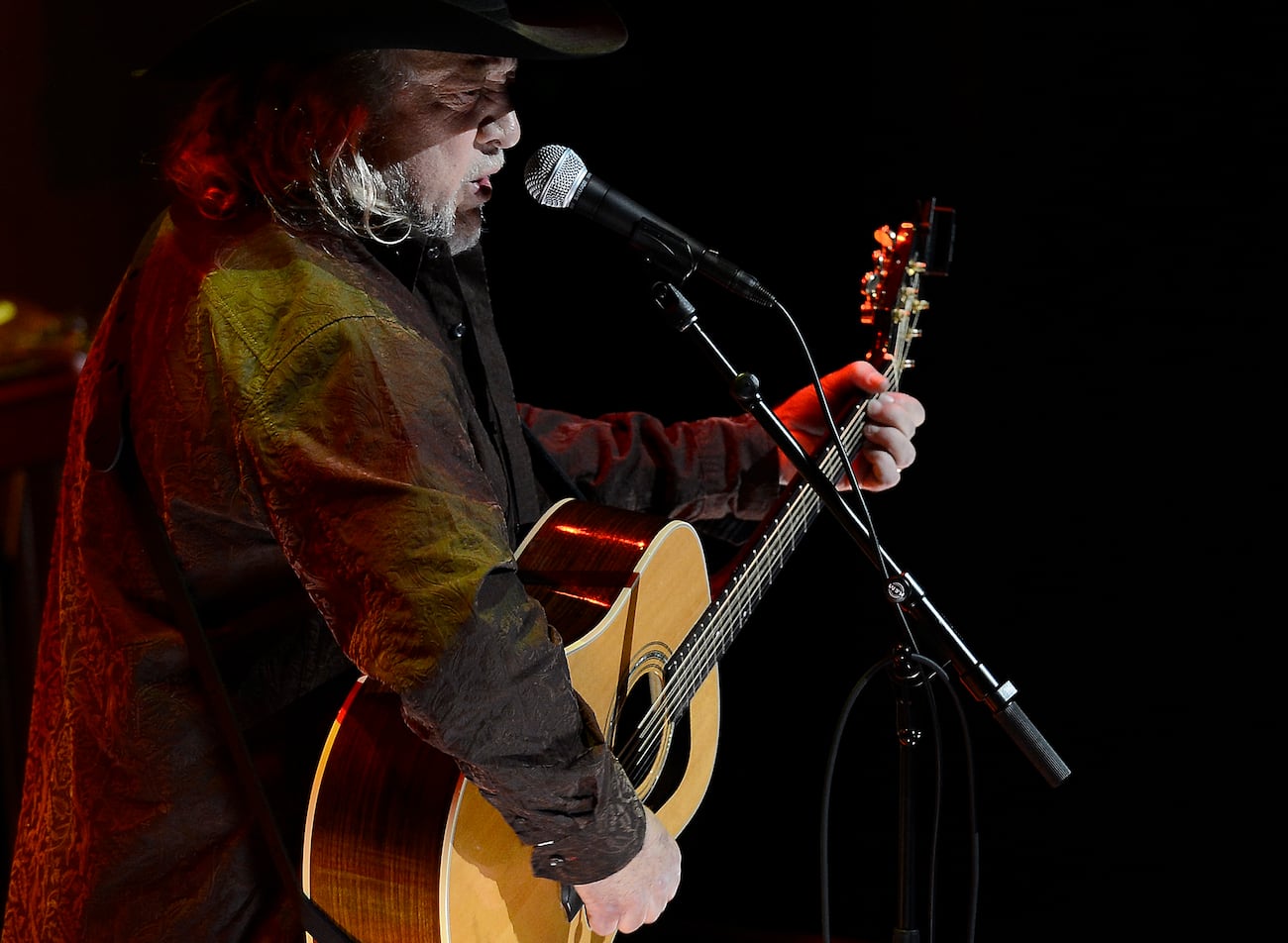 FILE - John Anderson performs "Marie Laveau" while honoring Country Music Hall of Fame...