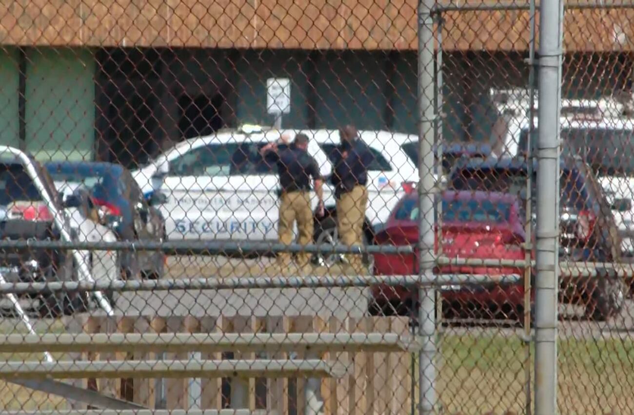 Officers are seen outside Whites Creek High School in Nashville on Tuesday morning.