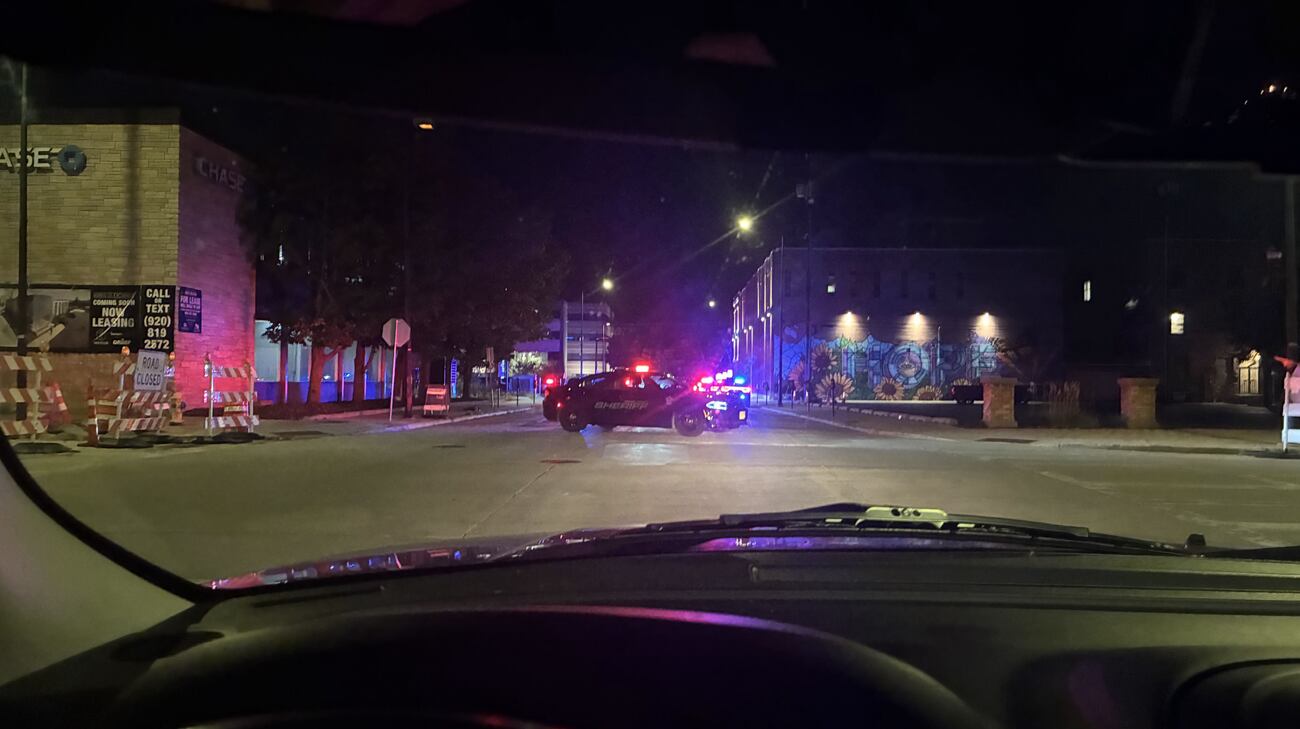 Green Bay police on the scene of an incident on Washington St. in downtown Green Bay