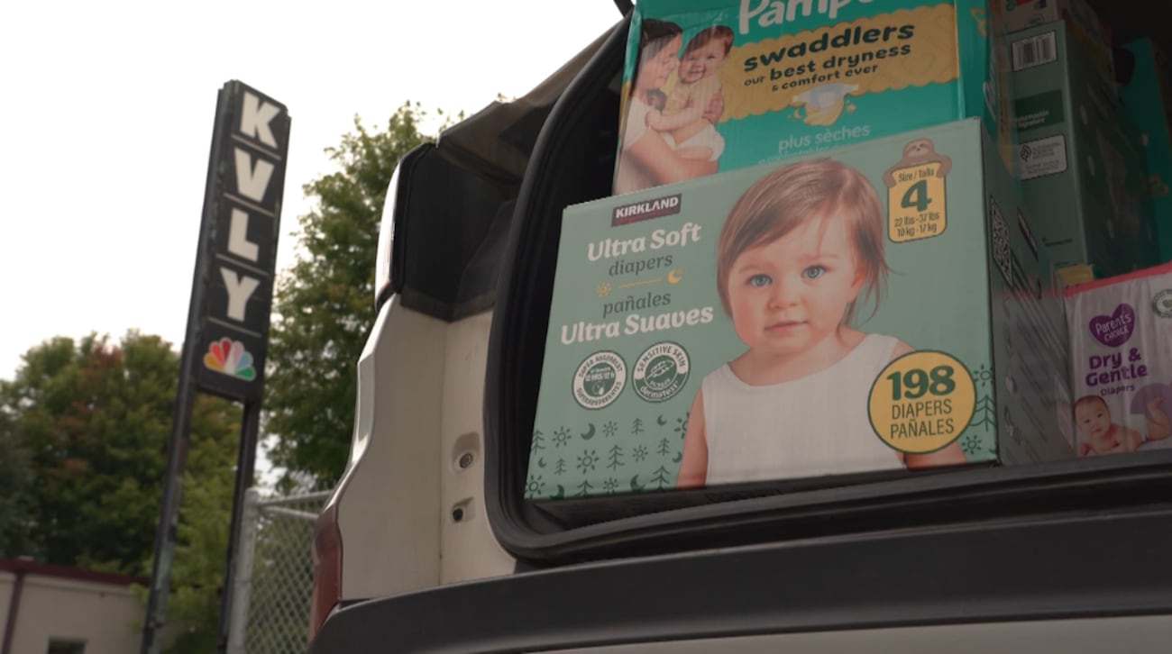 Boxes of diapers fill a Valley News Live vehicle outside the station during Wednesday's...