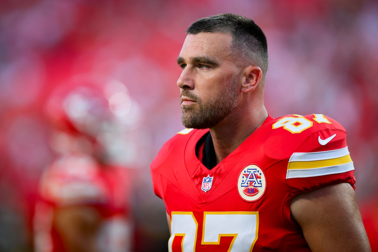 Kansas City Chiefs tight end Travis Kelce takes a break during warmups before the first half...