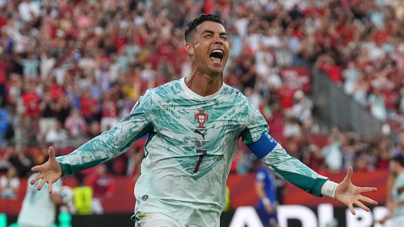 Portugal's Cristiano Ronaldo (7) celebrates after scoring their opening goal during the World...