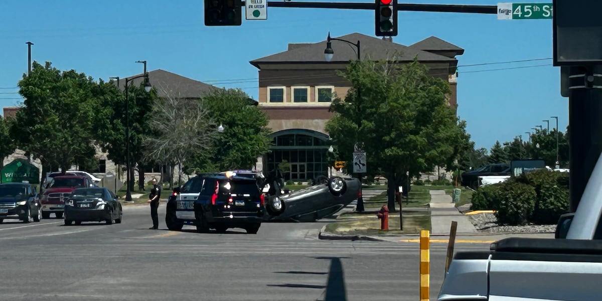 Vehicle flips in Fargo crash, driver cited