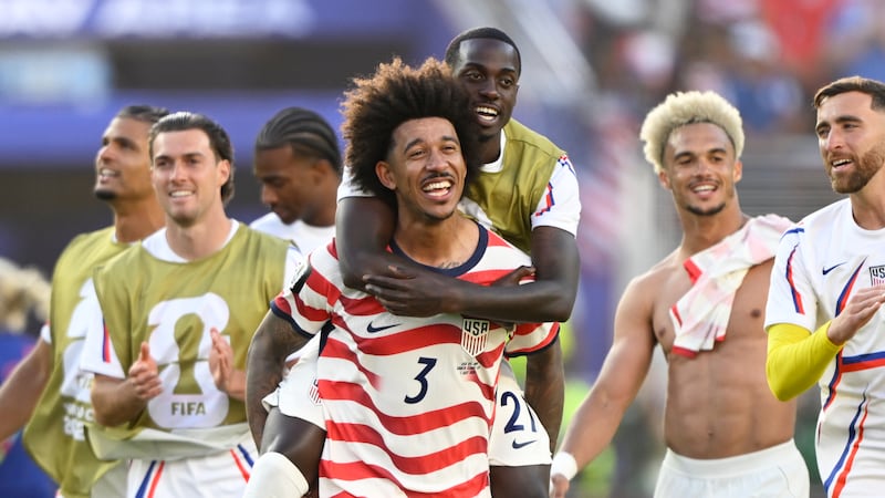 United States' Chris Richards (3) and United States' Timothy Weah, back, celebrate winning the...