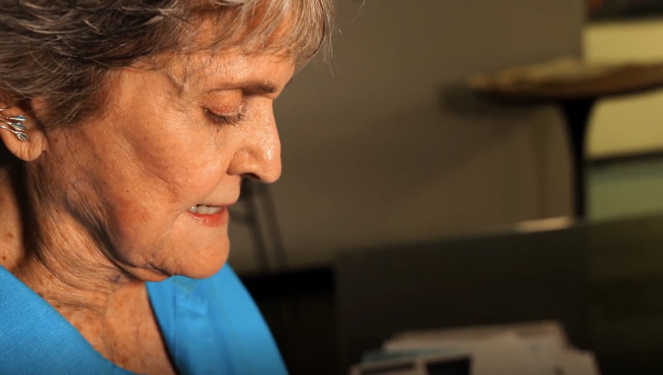 Jane Hotchkiss looks over her medical bill, which includes facility fees.