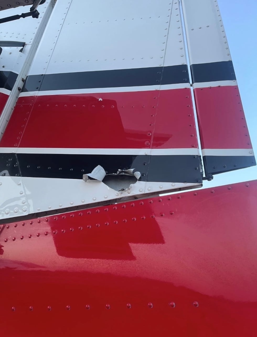 The St. Louis County Sheriff's office believes the plane was struck by a bullet after scooping...