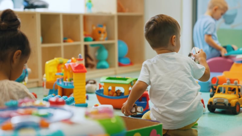 A stock image of children playing at a daycare