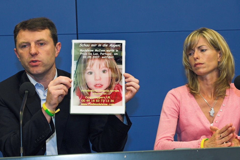 FILE - Gerry, left, and Kate McCann, parents of four-year old Madeleine McCann, present a...