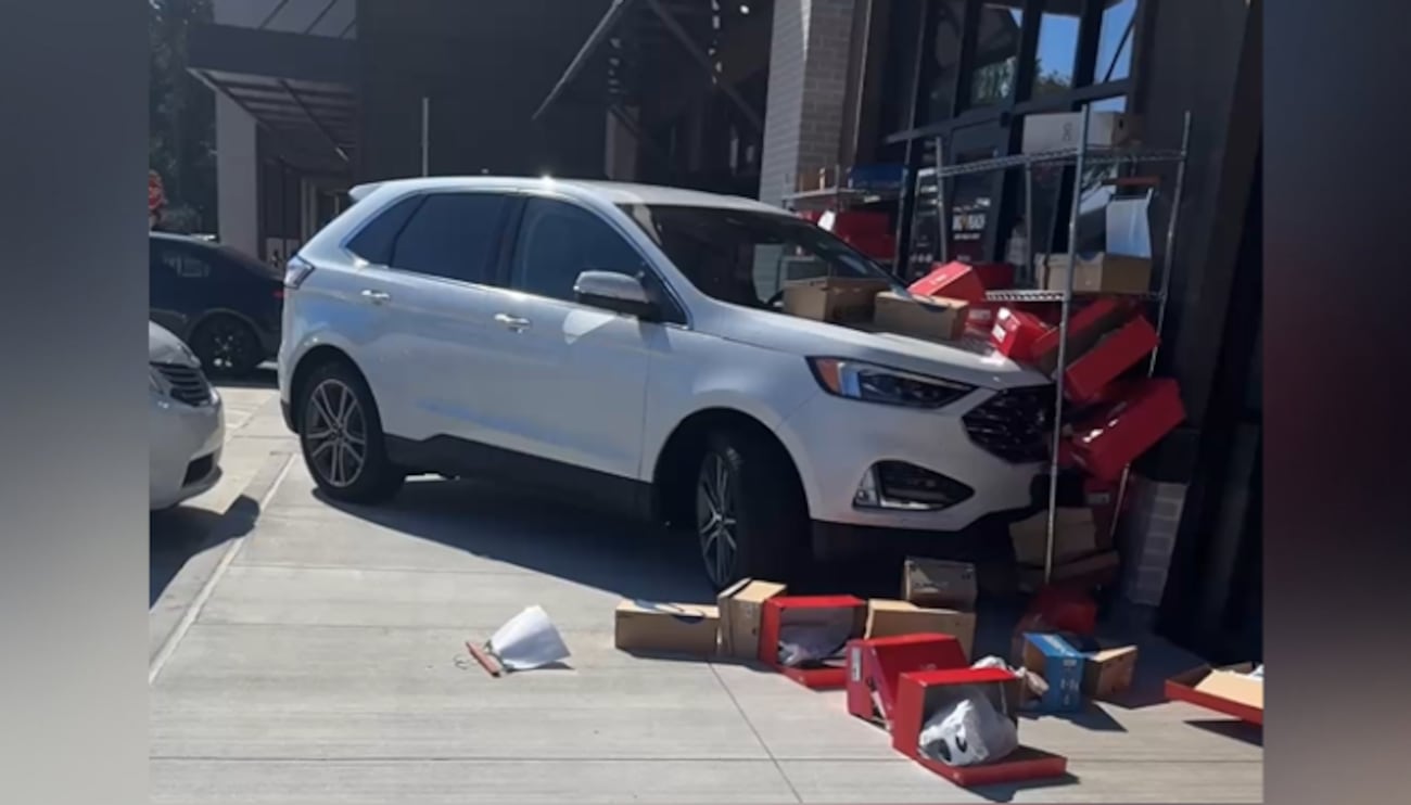 A father and his 22-month-old son were hit by a car while window-shopping at a Georgia...