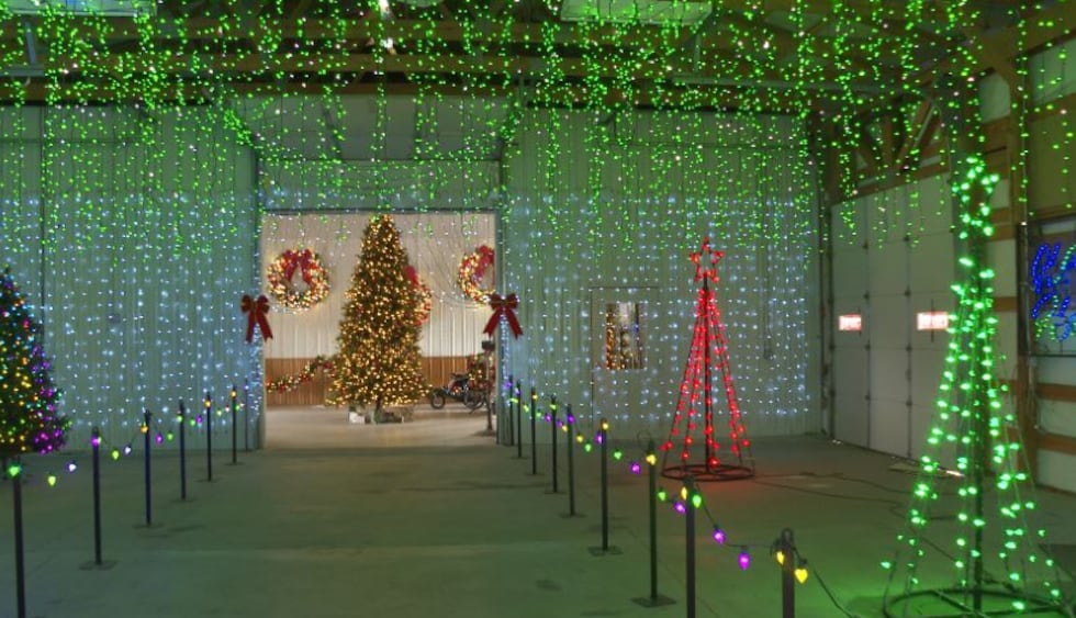 The display is located near the North Gate inside the Foltz Building, and seeing Santa is free.