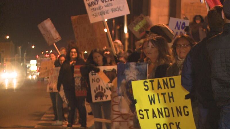Protesters rally against DAPL on Veterans Memorial Bridge